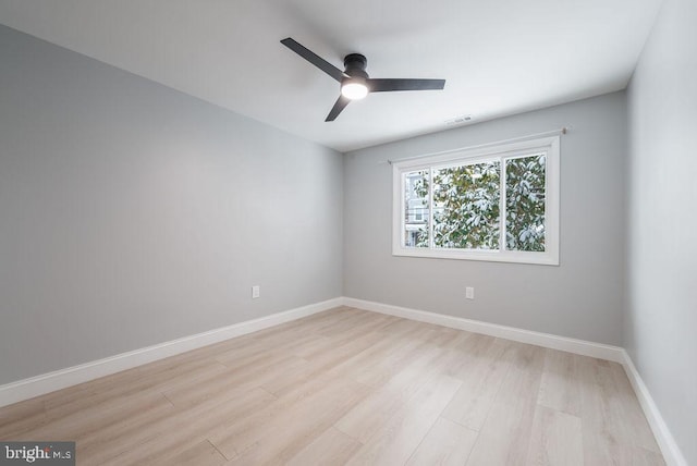 unfurnished room featuring light hardwood / wood-style flooring and ceiling fan