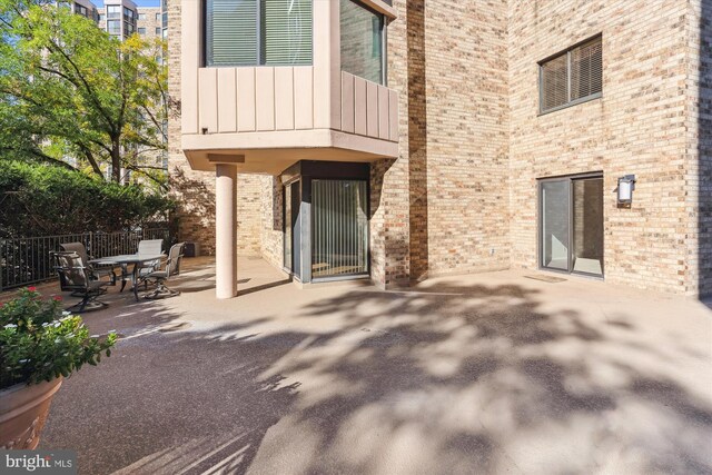 rear view of property featuring a patio