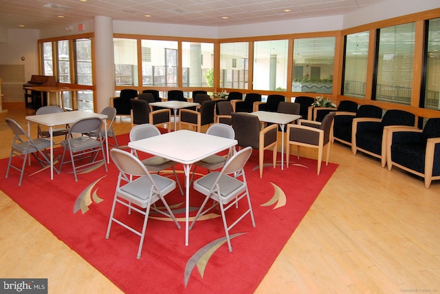 dining area featuring wood-type flooring