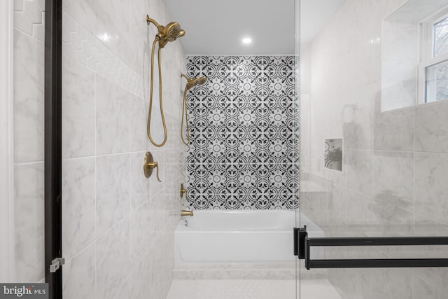 bathroom with tile walls