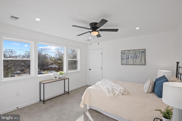 carpeted bedroom featuring ceiling fan