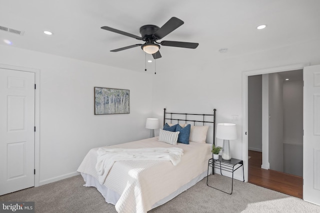 bedroom with ceiling fan and carpet