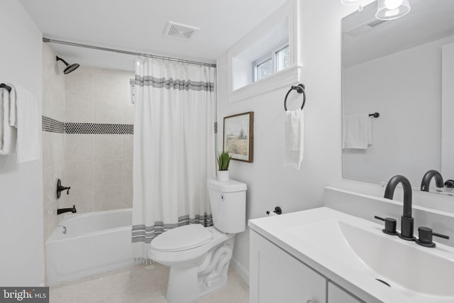 full bathroom with shower / bath combo with shower curtain, vanity, and toilet