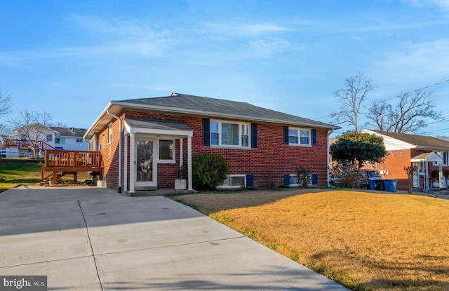 view of front of property with a front lawn and a deck