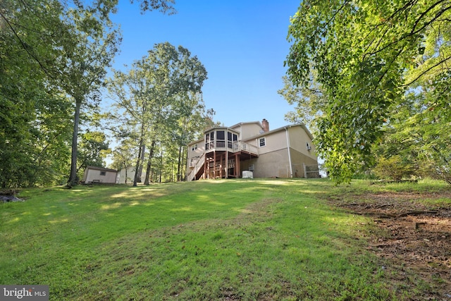 view of yard featuring a deck