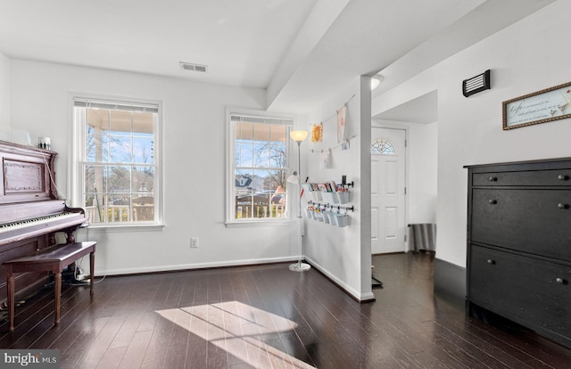 misc room with dark wood-type flooring