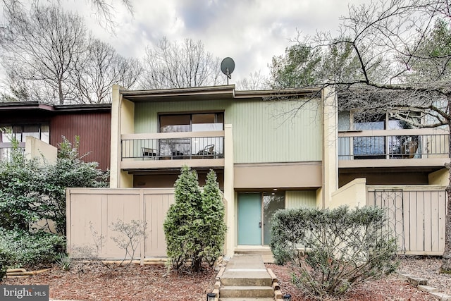 view of front of property with a balcony