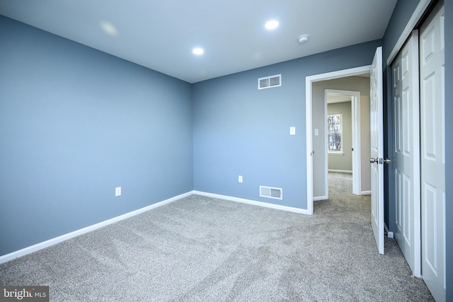 empty room featuring carpet