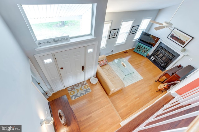 foyer featuring ceiling fan and hardwood / wood-style floors