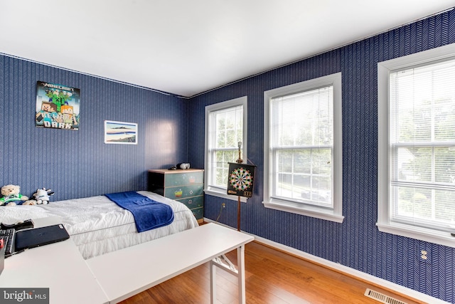 bedroom featuring hardwood / wood-style flooring