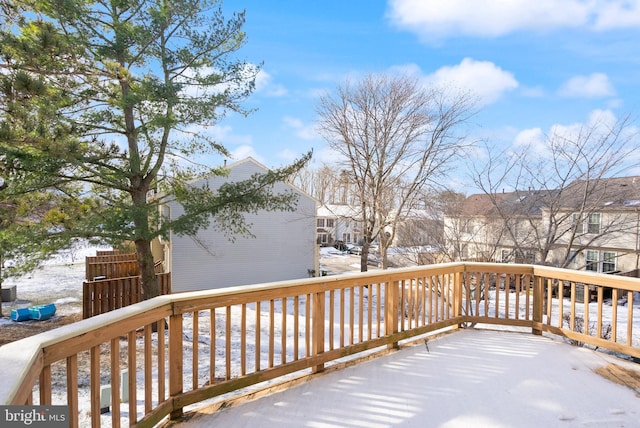 view of snow covered deck