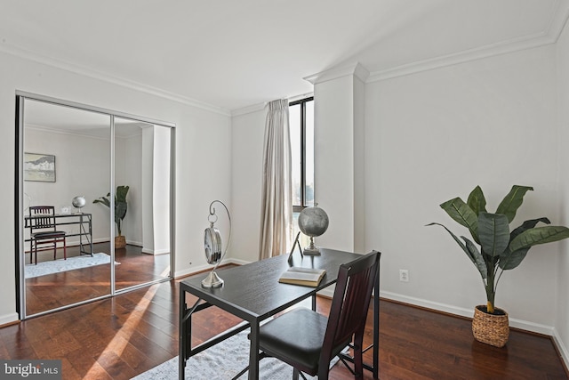 office space with dark hardwood / wood-style flooring and crown molding