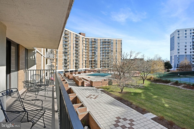 balcony featuring a hot tub