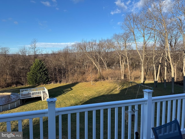 view of yard with a deck