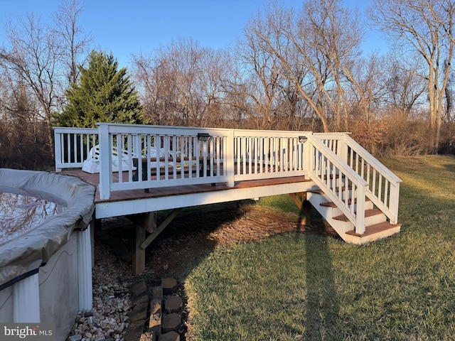 deck featuring a yard