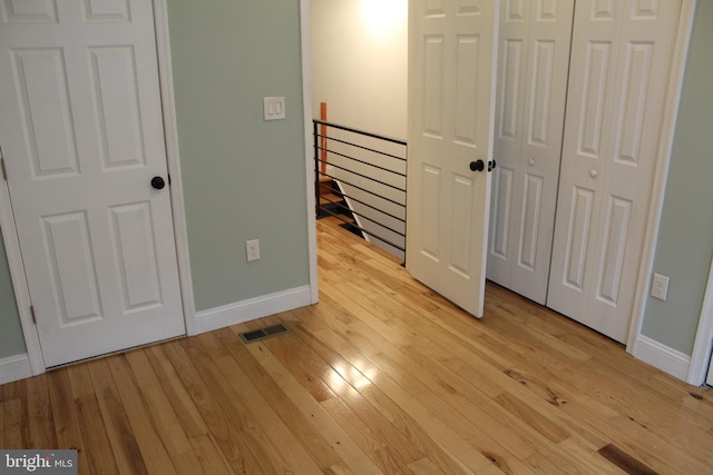 unfurnished bedroom featuring light hardwood / wood-style flooring