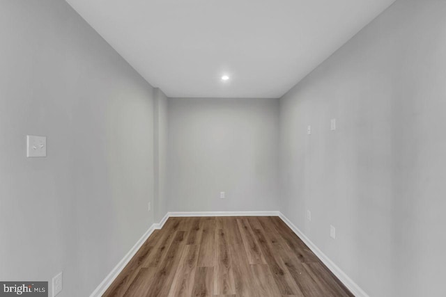 empty room featuring hardwood / wood-style flooring