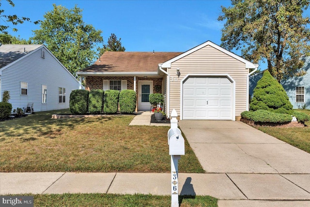 single story home featuring a garage and a front lawn