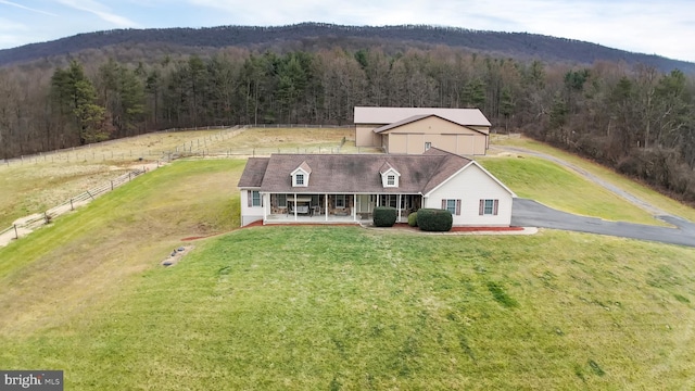 birds eye view of property featuring a mountain view