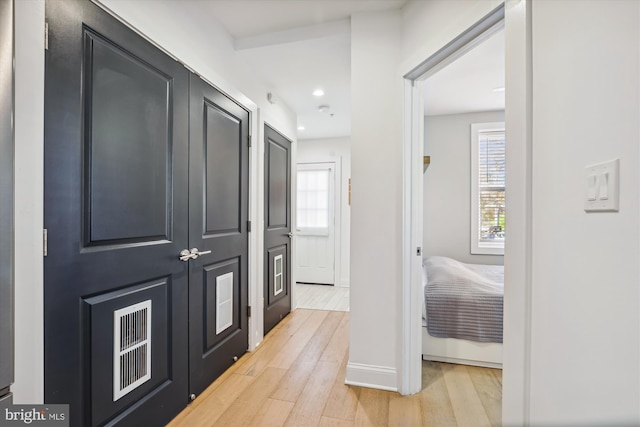 hallway featuring light wood-type flooring