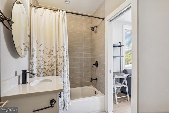 bathroom with vanity and shower / bathtub combination with curtain