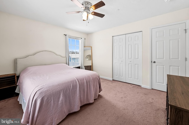 bedroom with ceiling fan and carpet