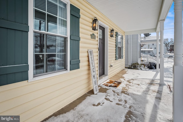 view of snow covered patio