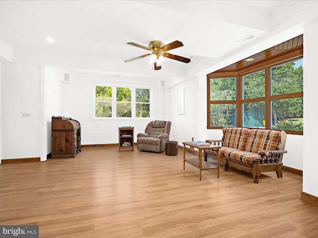 sitting room featuring light wood-type flooring and ceiling fan