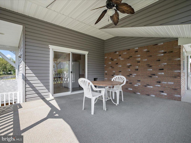 view of patio featuring ceiling fan