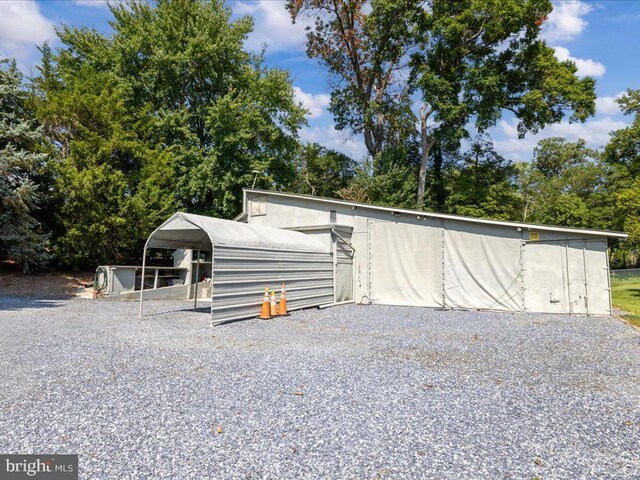 view of outdoor structure featuring a carport