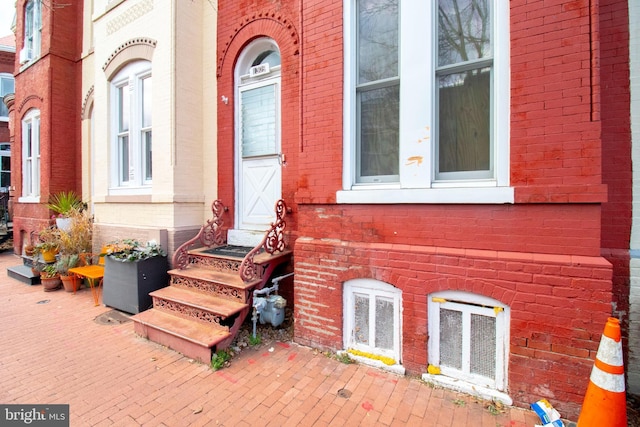 property entrance with a patio