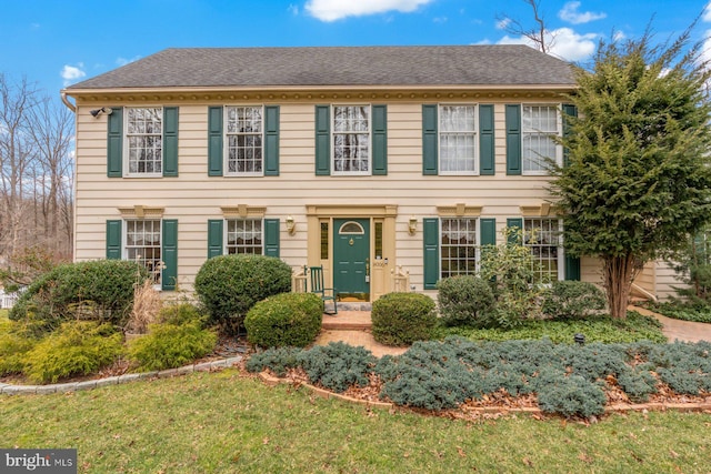 colonial house with a front lawn