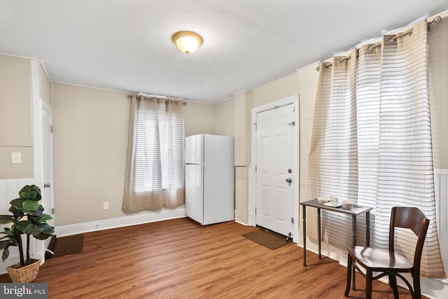 sitting room with light wood finished floors