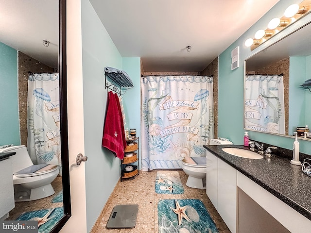 bathroom with a shower with curtain, vanity, and toilet