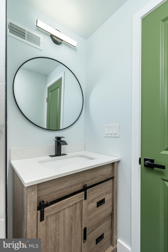 bathroom featuring vanity