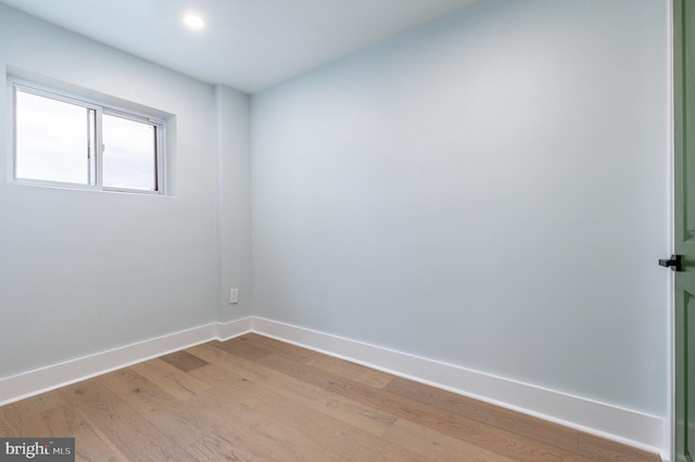 unfurnished room featuring light hardwood / wood-style flooring