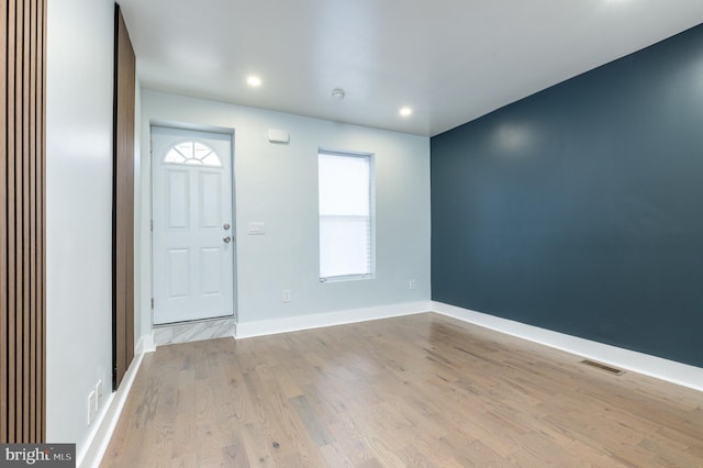 entrance foyer with light hardwood / wood-style floors