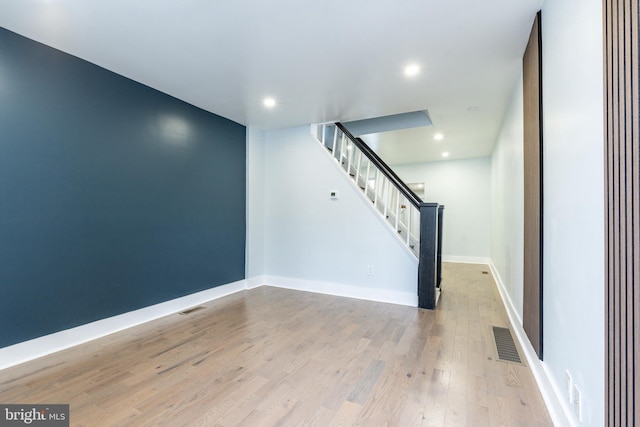 interior space with hardwood / wood-style floors