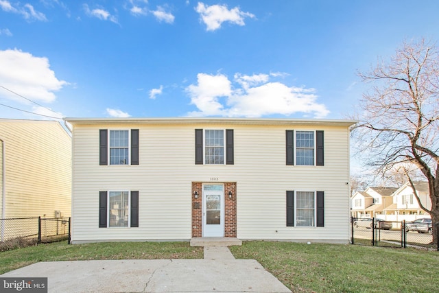 view of front of home with a front lawn