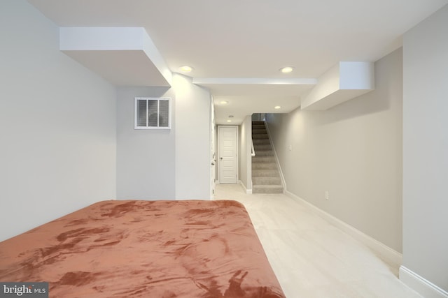 unfurnished bedroom with light carpet