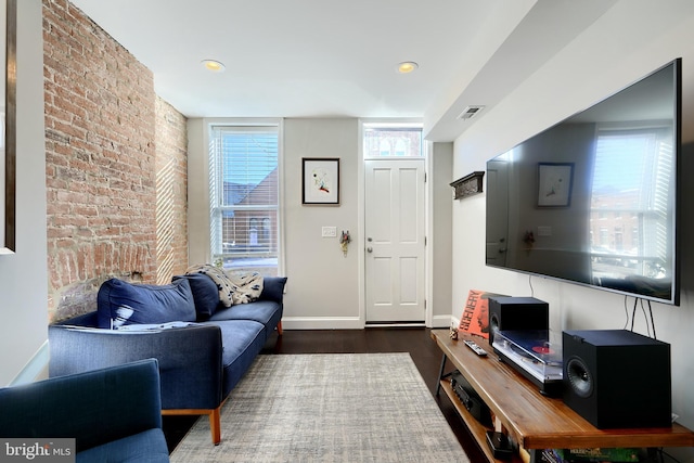 living room with dark hardwood / wood-style floors