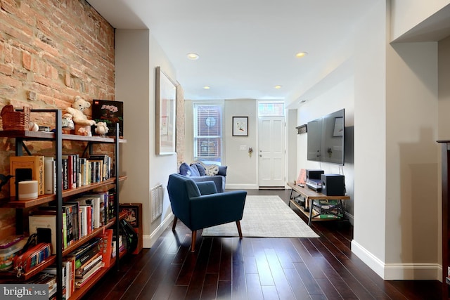 living area featuring dark hardwood / wood-style floors