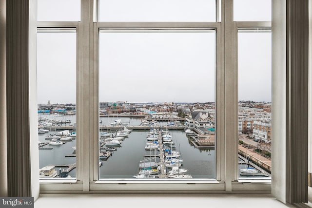 doorway to outside with a water view