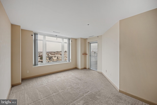 view of carpeted spare room