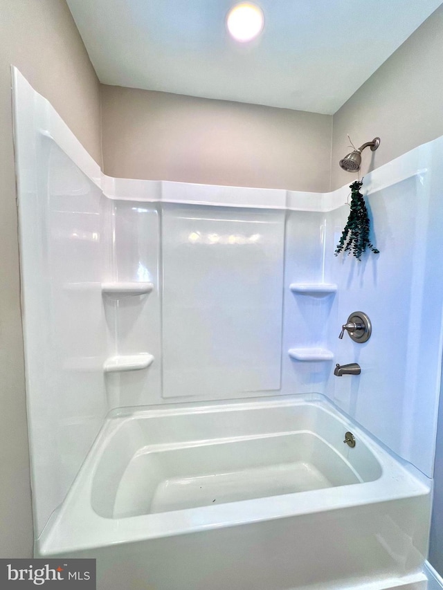 bathroom with shower / bath combination