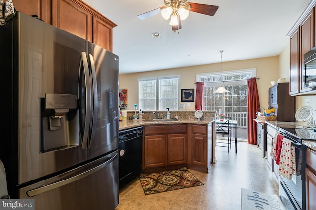 kitchen with sink, plenty of natural light, range with electric cooktop, black dishwasher, and stainless steel refrigerator with ice dispenser