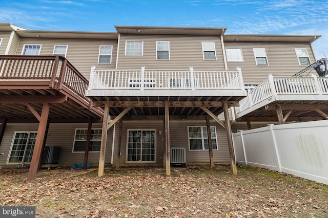 back of property featuring a wooden deck and central air condition unit