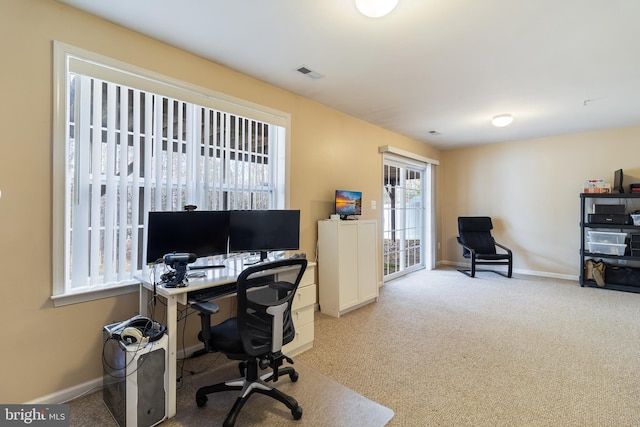 view of carpeted office space