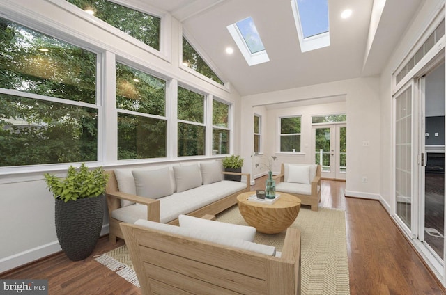 sunroom / solarium with french doors and lofted ceiling