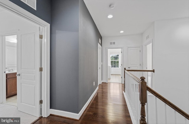 corridor featuring light hardwood / wood-style flooring